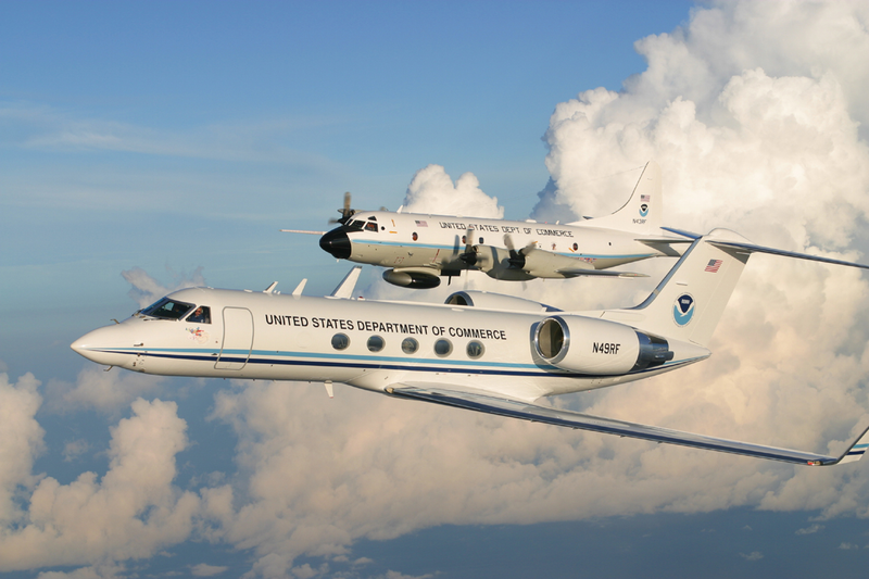 A NOAA WP-3D and the Gulfstream IV fly in formation. NOAA photo